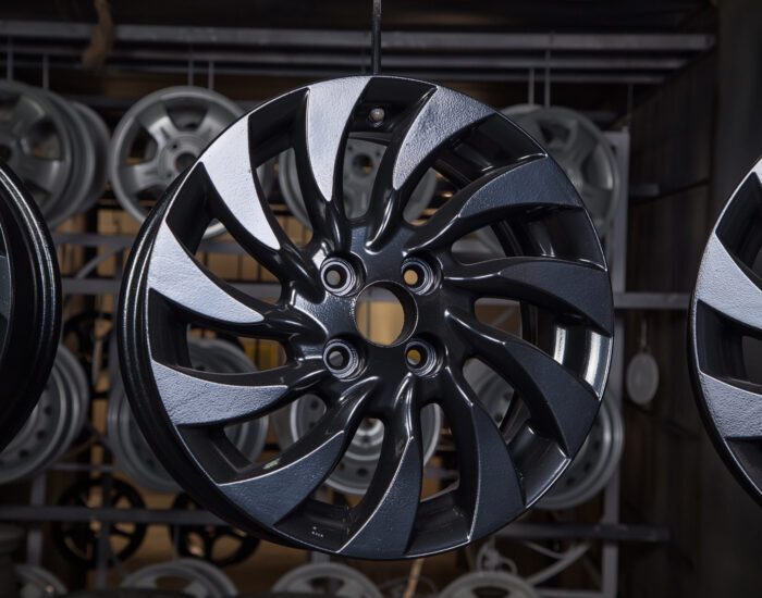 Drying of black disks after powder coating